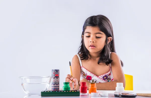 depositphotos_114969148-stock-photo-indian-girl-colouring-or-painting
